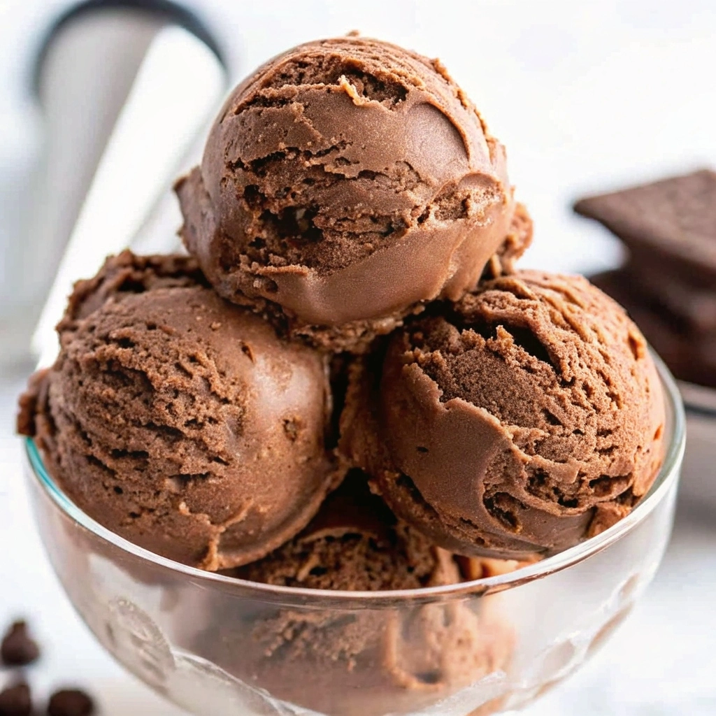 Homemade Chocolate Ice Cream Recipe You’ll Love 5 Featured image of homemade chocolate ice cream recipe in a rustic bowl