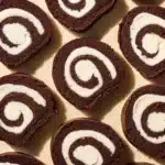 Ice Cream Cake Roll: A Classic Dessert You’ll Always Crave 6 Close-up of chocolate cake roll slices filled with vanilla cream