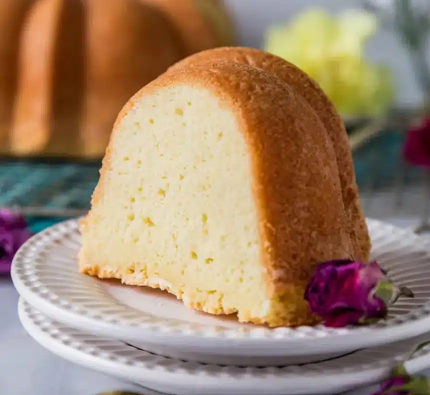 Pound Cake Recipe Using Cream Cheese – Moist, Rich & Irresistible 3 Slice of moist cream cheese pound cake on a white plate