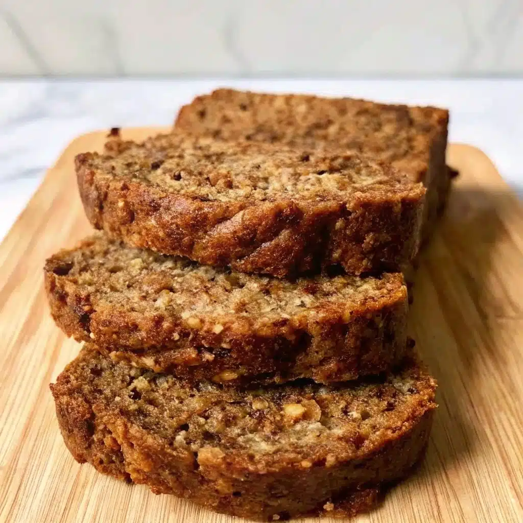 gluten-free-zucchini-bread-featured.jpg Gluten free zucchini bread sliced on wooden board