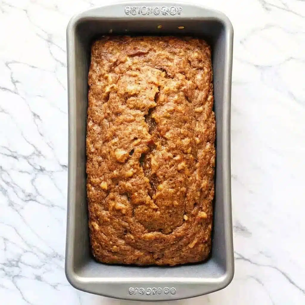 gluten-free-zucchini-bread-serving.jpg Slice of gluten free zucchini bread with almond butter