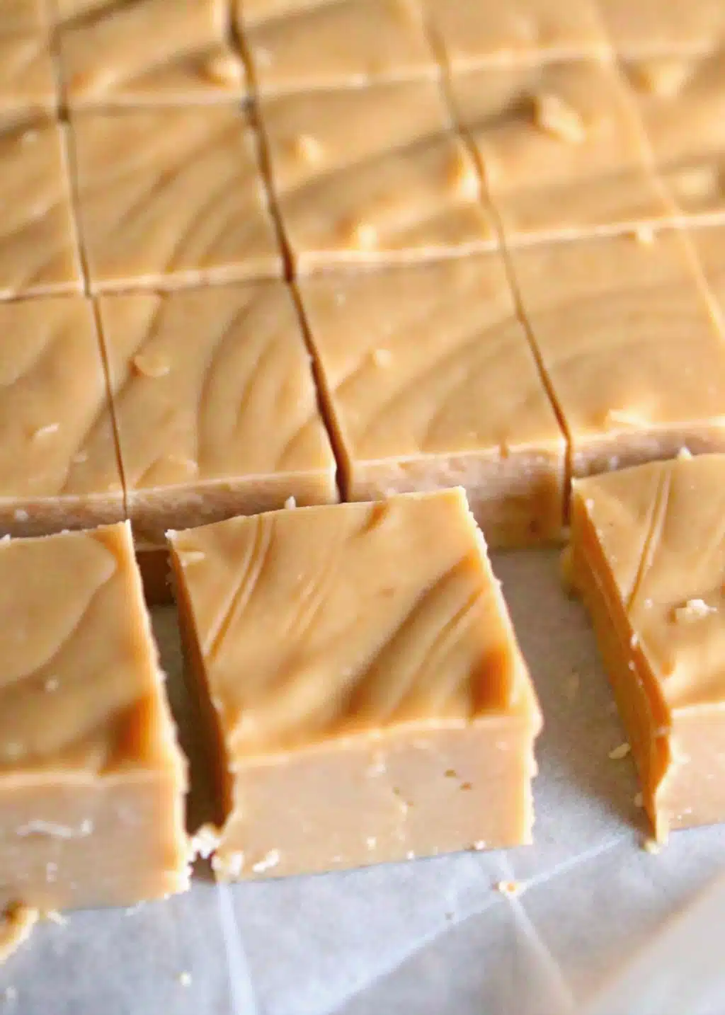 3-ingredient-peanut-butter-fudge-featured.jpg 3 ingredient peanut butter fudge stacked in squares